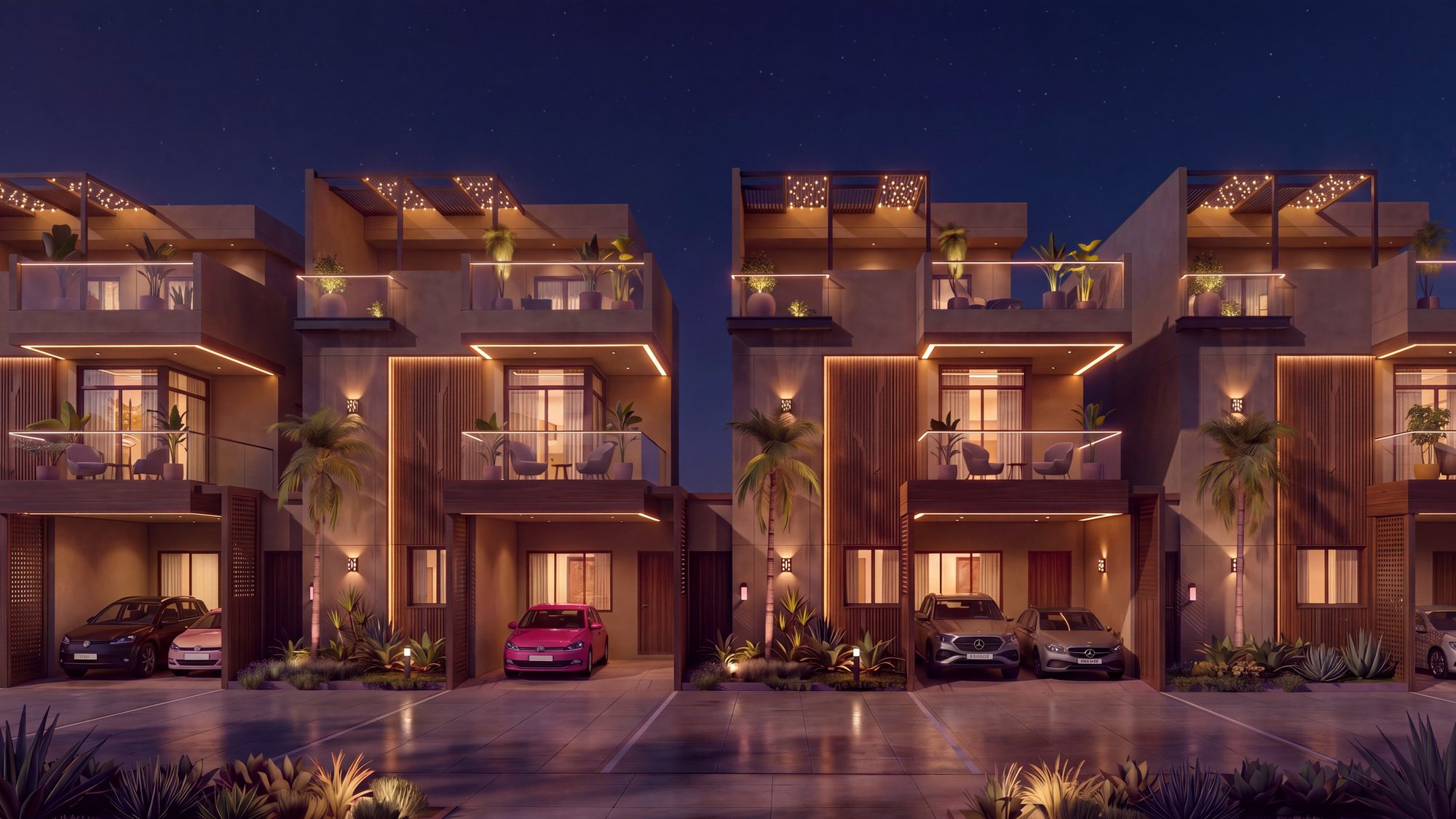 A row of east facing villas lit up at night, architect’s view